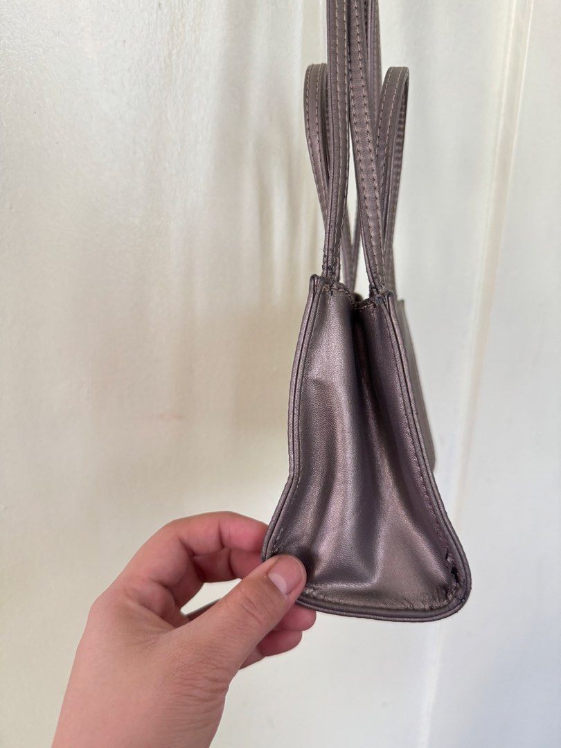 Telfar Shopping Bag (s) (Category: Cross-body Bags) located in Quezon City. Submitted by prelovedbyellee (Listing ID 1464568055, Image 3). Description: - small size - bag only - bronze color.