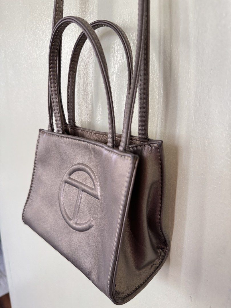 Telfar Shopping Bag (s) (Category: Cross-body Bags) located in Quezon City. Submitted by prelovedbyellee (Listing ID 1464568055, Image 2). Description: - small size - bag only - bronze color.