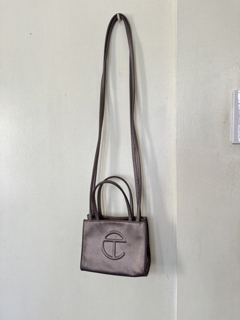 Telfar Shopping Bag (s) (Category: Cross-body Bags) located in Quezon City. Submitted by prelovedbyellee (Listing ID 1464568055, Image 1). Description: - small size - bag only - bronze color.