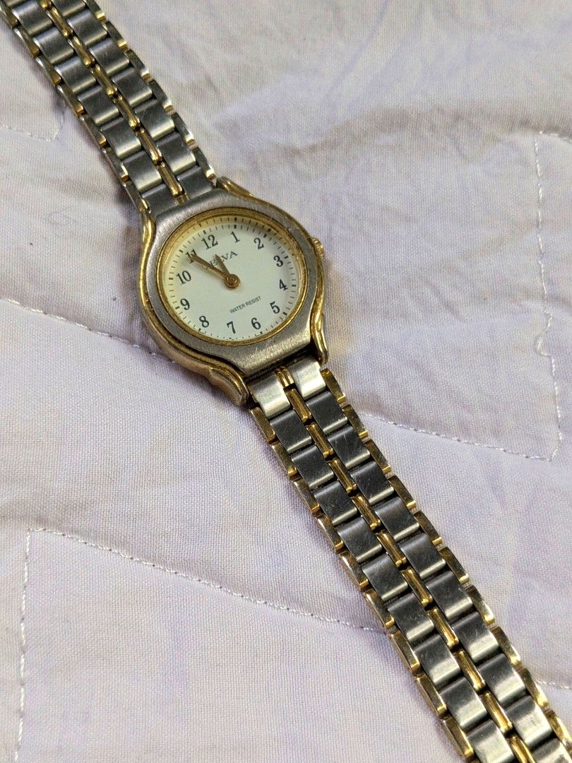 Telva Japan Vintage Watch (Category: Women's Watches) located in Quezon City. Submitted by nnncorner (Listing ID 1464438553, Image 3). Description: Telva Japan Two Tone Vintage Watch 100% original in presentable looking and condition no issues fits 16-18cm wrist only 1 peso coin dial size water resistant no scratches or hairlines on glass face with replacement box selling only for 1950.