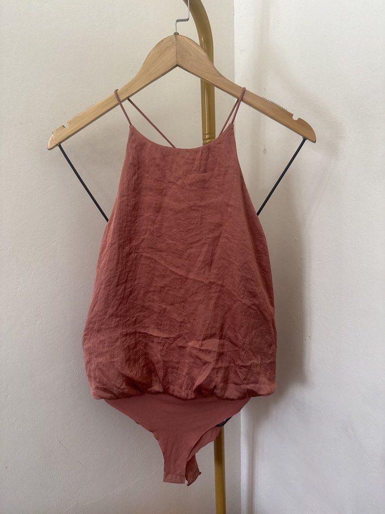 Terracotta Matte Silk Bodysuit (Category: Others Tops) located in Mexico. Submitted by studioleraph (Listing ID 1464405278, Image 1). Description: 🛍️ Perfect for your personal wardrobe 🫶 👗 The actual item being sold is the original garment shown in the product photos. Small differences in fit, drape, color, texture, or details may occur. 💌 Condition: • Preloved; Please wash the items before wearing. • Please manage expectations as these are v