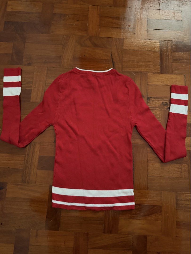 Terranova Red Striped Long Sleeve Sweater (Category: Longsleeves) located in Paranaque City. Submitted by ferrewr (Listing ID 1464409430, Image 2). Description: - Cozy red sweater - White stripes on sleeves and hem - Classic crew neck - Long sleeves - Ribbed knit texture - Ideal for casual wear.