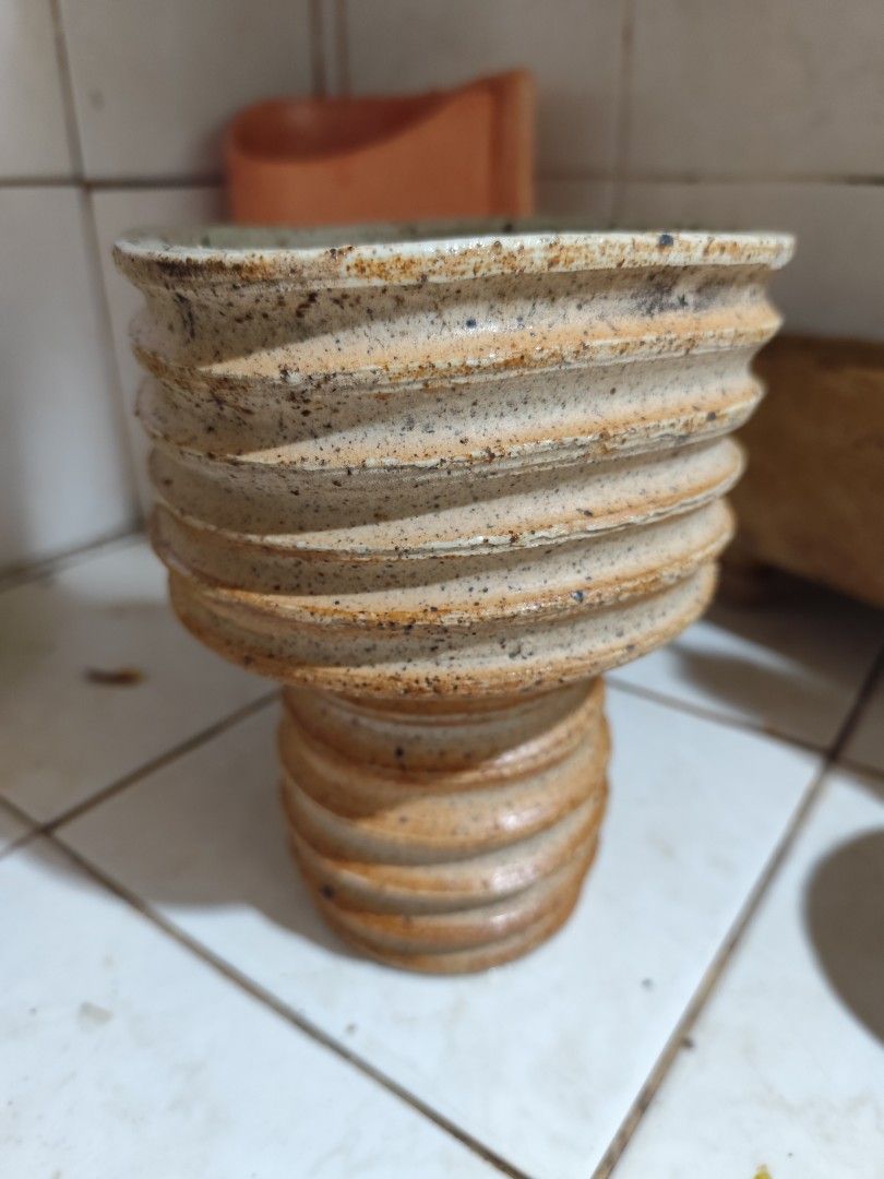 Textured Ceramic Pot Planter (Category: Pots & Planters) located in Manila. Submitted by marriage031073advocate (Listing ID 1464429965, Image 2). Description: - Unique textured ceramic pot - Rustic, earthy feel - Ideal for small plants or succulents - Speckled interior design - Ribbed exterior for a natural touch - Dimensions: Approx. X" tall x Y" wide.