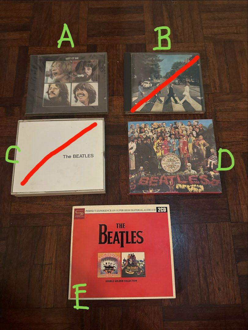 The Beatles CDs (Category: CDs & DVDs) located in Quezon City. Submitted by kittyrawr5 (Listing ID 1454846921, Image 1). Description: A: Let It Be - still in plastic wrapping, so there’s no pic of actual CD B: SOLD C: SOLD D: Sgt. Pepper’s Lonely Hearts Club Band - still in plastic wrapping, so there’s no pic of actual CD E: The Beatles: Double Golden Collection - 2 CDs - individual cd: PHP 400 - all remaining cds: PHP 800.