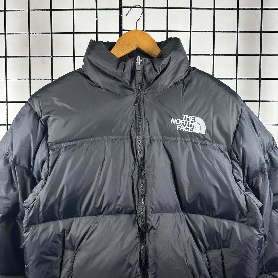 The North Face 1996 Retro Nuptse Jacket Black (Category: Coats, Jackets and Outerwear) located in Baguio. Submitted by luxurysales2600 (Listing ID 1464453040, Image 2). Description: - The North Face 1996 Retro Nuptse Jacket - Color: Black - Size: Medium (M) - Made in Bangladesh - Features Responsible Down Standard (RDS) certification - Ideal for cold weather conditions - Check tags for more details - Feel free to message with any questions!.