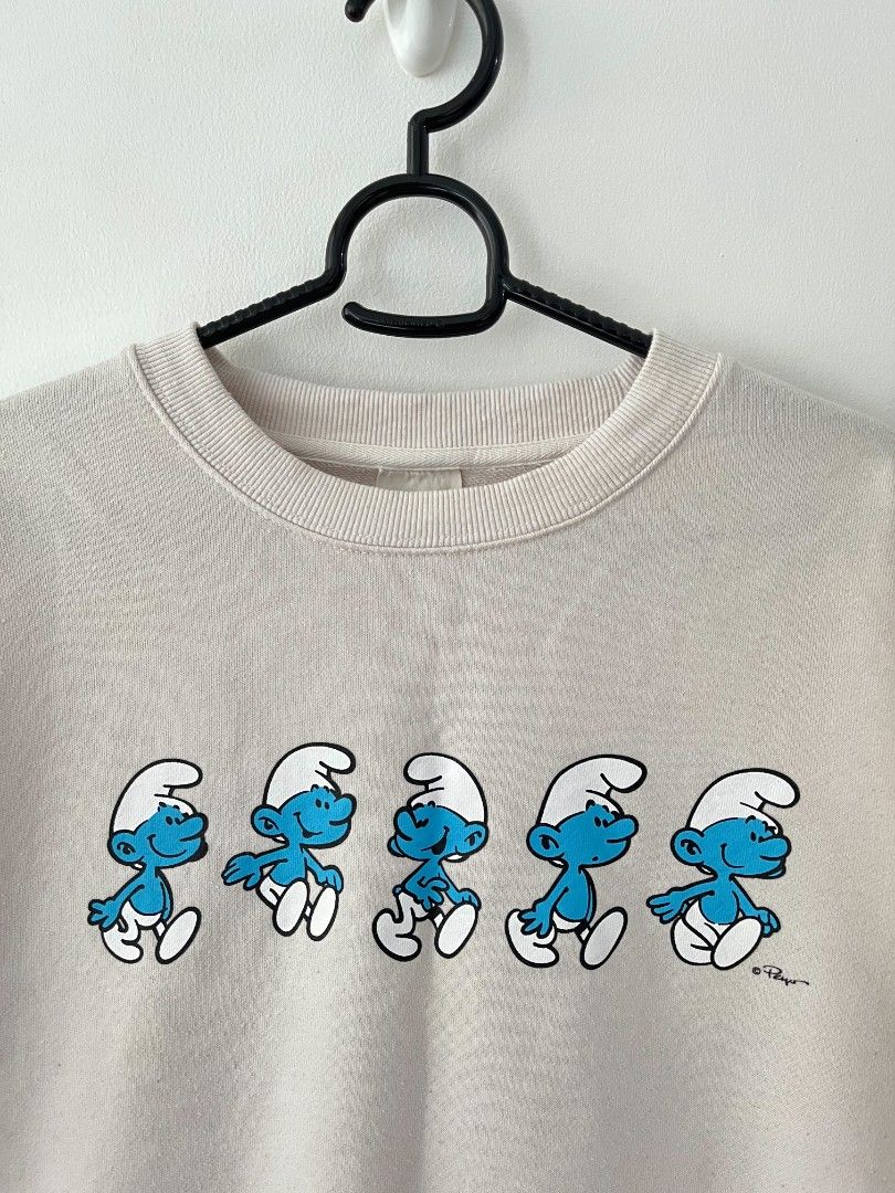 The Smurfs Sweater (Category: Coats, Jackets and Outerwear) located in Quezon City. Submitted by mariaplusmoshi (Listing ID 1464525415, Image 2). Description: deets alr posted 📍EVER, COMMONWEALTH, Q.C MOP: GCASH LALAMOVE/J&T.