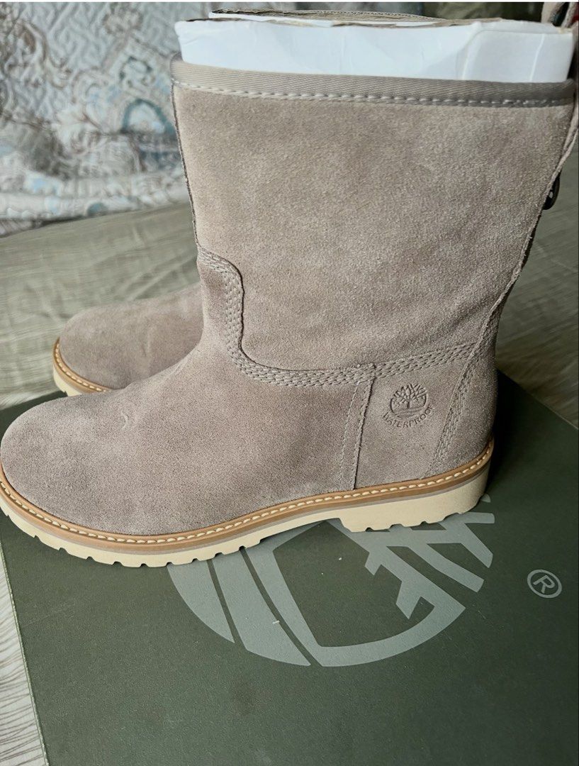 Timberland Waterproof Suede Boots - Taupe (Category: Boots) located in Quezon City. Submitted by letsforsale (Listing ID 1464364301, Image 1). Description: - Authentic Timberland waterproof suede boots - Color: Taupe - Height: Mid-calf - Features: Comfortable and durable for everyday wear - Design: Classic Timberland logo on the side - Condition: Comes with original box.