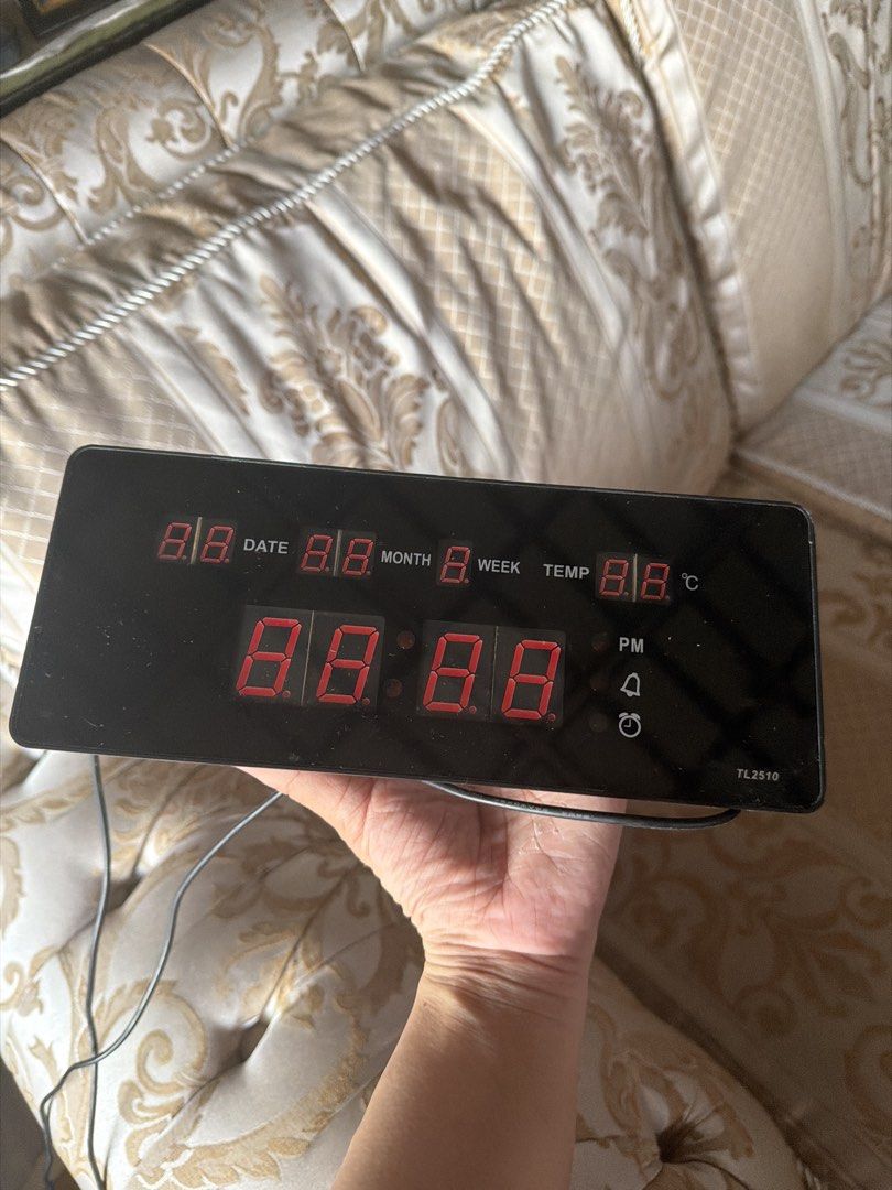 TL2510 Digital Clock with Date, Month, Week, and Temperature Display (Category: Clocks) located in Caloocan City. Submitted by criddyrabb11103 (Listing ID 1464367781, Image 1). Description: FREE for purchases Php 500 above - Sleek black digital clock (Model TL2510) - Bright red LED display - Shows date, month, week, and temperature - Includes alarm and PM indicators - Ideal for desk or bedside table.
