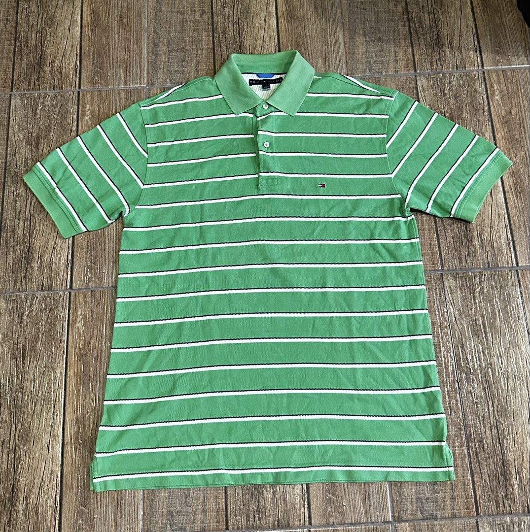 TOMMY STRIPES GREEN (Category: Tshirts & Polo Shirts ) located in Manila. Submitted by urban-vintage_2 (Listing ID 1464458228, Image 1). Description: ISSUE: NONE ( NEED WASH ) MOP :GCASH ( NO COD ) SHIP VIA : LALAMOVE & J&T LOCATION : PASIG CITY LENGTH : 30 WIDTH : 23.