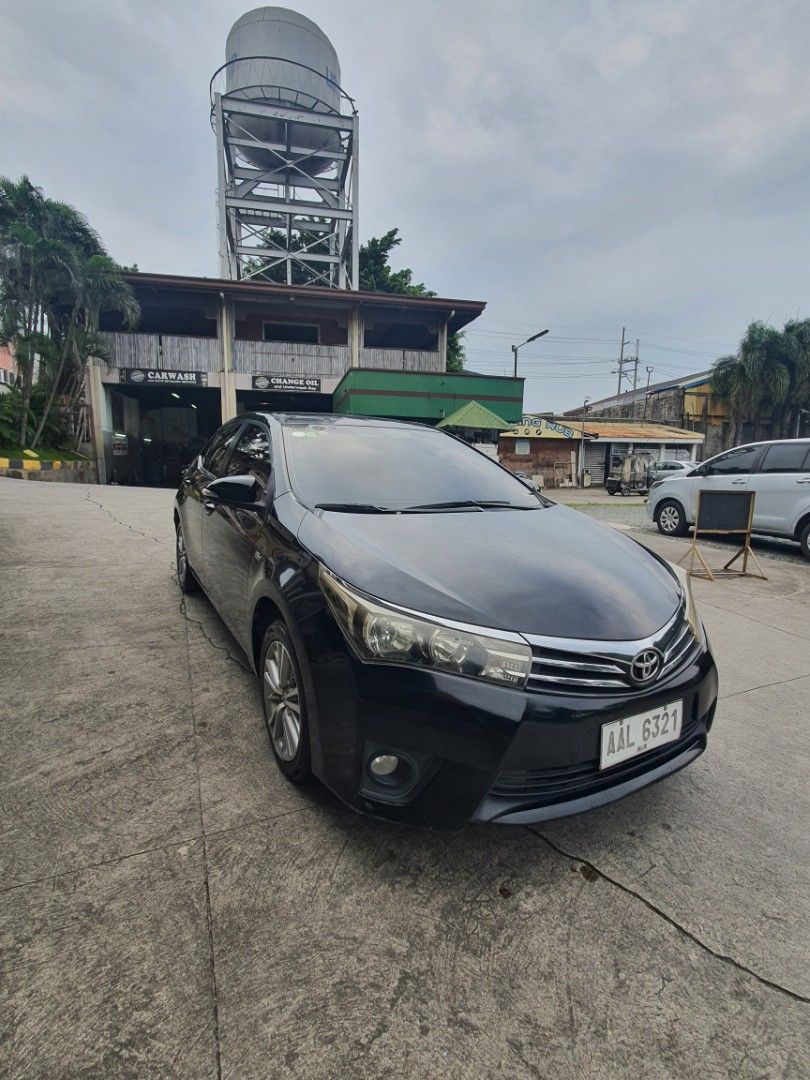 Toyota Corolla Altis 1.6 Auto (Category: Used Cars) located in Manila. Submitted by tony317405 (Listing ID 1464562197, Image 3). Description: Toyota Altis 2014 Model AT Transmission Color Altitude Black Odometer 119888 KM RFS Seldom Use where is as is very negotiable.