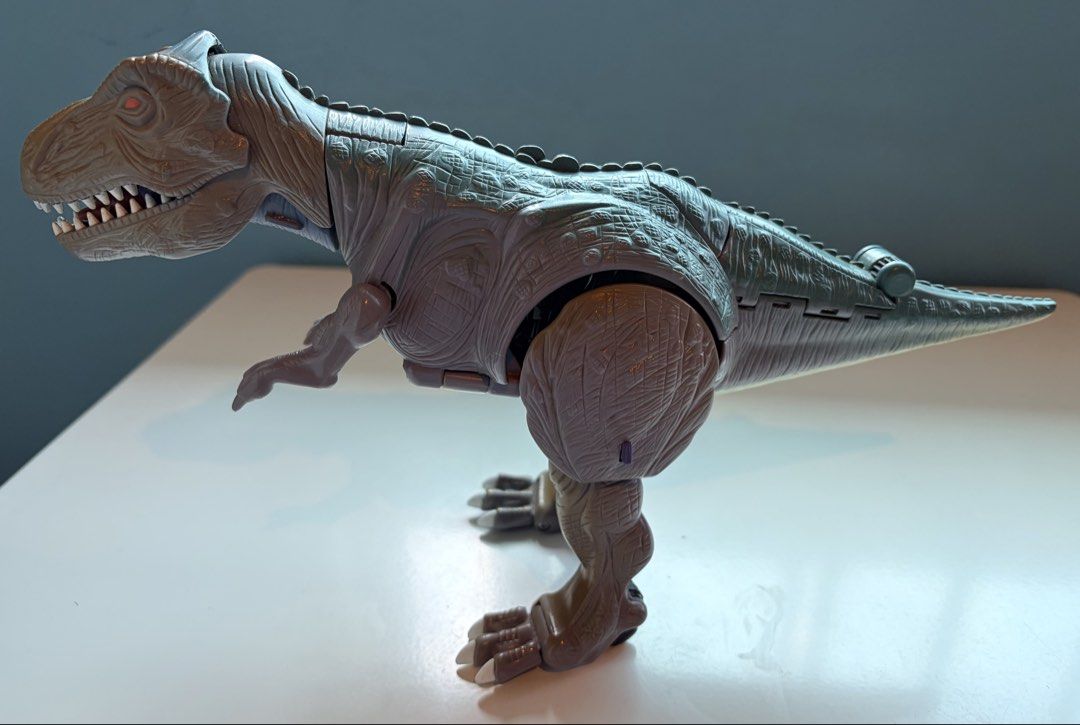 Transformers (T-Rex line) Grimlock and Megatron Figures (Category: Action & Battle Toys) located in Santa Rosa. Submitted by serf60762 (Listing ID 1464491853, Image 1). Description: Selling the following Transformers T-Rex action figures: 1. Transformers: Beast Wars Ultra Class Megatron (1995) by Hasbro for PhP 2K 2. Transformers Classics Deluxe Class Grimlock (2006) by Hasbro for PhP 2K 3. Transformers Animated Voyager Class Grimlock (2008) by H