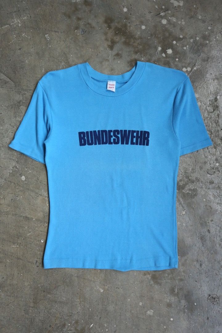 Trigema - “Bundeswehr” Modell B (Category: Tshirts & Polo Shirts ) located in Manila. Submitted by graymatter_ (Listing ID 1464450501, Image 1). Description: Trigema - “Bundeswehr” Modell B German Army Training Uniform similar to the runway from Vetements S/S 27 Tagged Size: Gr. 4 Condition: 8.5/10 Flaws: Minor Discoloration at Front Material: 100% Cotton Made in: Dimensions Length: 22.5 Width: 17 Shoulder: 19 Sleeve: 8.5 .