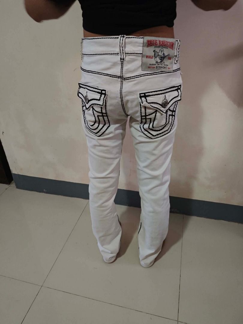 True Religion White Jeans with Black Stitching Size 30 (Category: Jeans) located in Caloocan City. Submitted by silverbird_6c038f (Listing ID 1464455547, Image 3). Description: - White True Religion Jeans - Size: 30 - Black contrast stitching - Distressed details on legs - Straight seat fit - Made in USA - Ideal for a casual look.