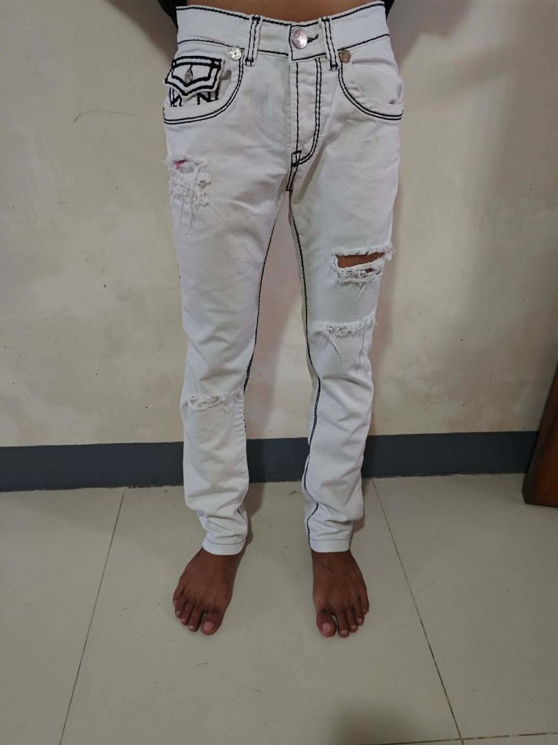 True Religion White Jeans with Black Stitching Size 30 (Category: Jeans) located in Caloocan City. Submitted by silverbird_6c038f (Listing ID 1464455547, Image 2). Description: - White True Religion Jeans - Size: 30 - Black contrast stitching - Distressed details on legs - Straight seat fit - Made in USA - Ideal for a casual look.
