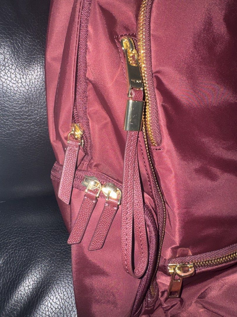 tumi celina bagpack (Category: Laptop Bags & Sleeves) located in Caloocan City. Submitted by izzie_finds (Listing ID 1464437386, Image 2). Description: Double-zip entry to main compartment Zip entry to padded laptop compartment (fits up to a 15” PC or 16” MacBook screen) Leather top handle Front U-zip pocket 2 front zip pockets Front zip entry to main compartment Side zip pocketSide double-zip water-resistant water bottle pocket Padded adjustable