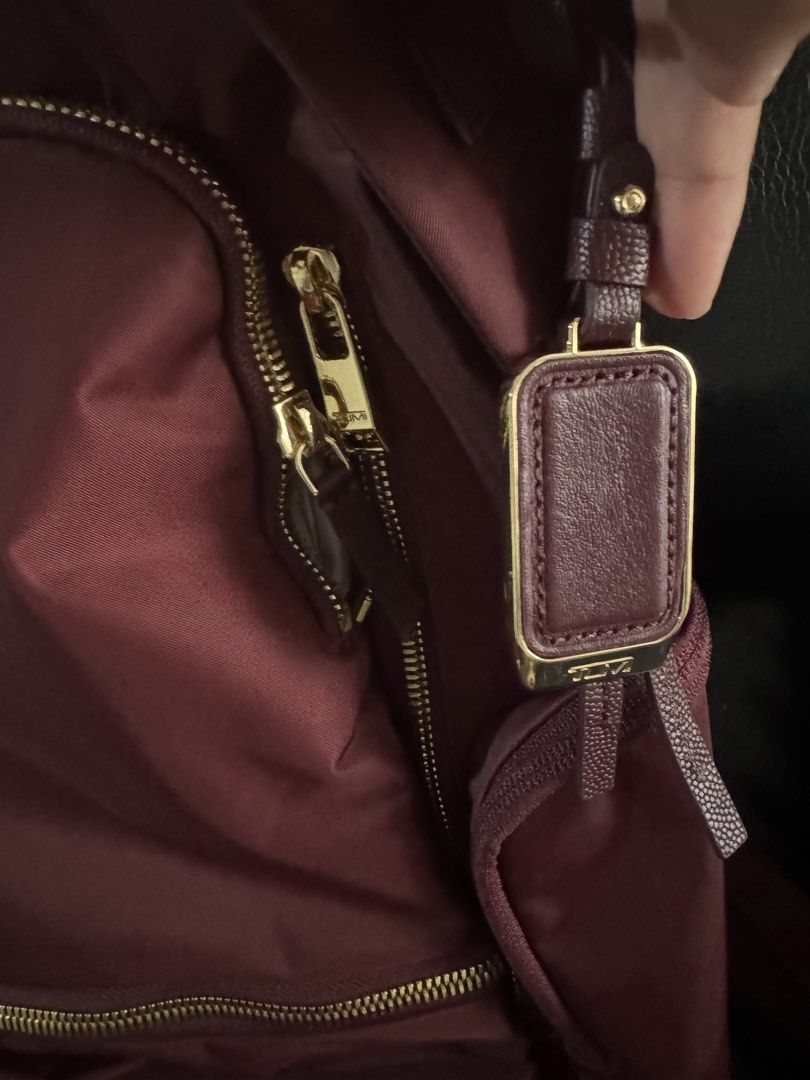 tumi celina bagpack (Category: Laptop Bags & Sleeves) located in Caloocan City. Submitted by izzie_finds (Listing ID 1464437386, Image 3). Description: Double-zip entry to main compartment Zip entry to padded laptop compartment (fits up to a 15” PC or 16” MacBook screen) Leather top handle Front U-zip pocket 2 front zip pockets Front zip entry to main compartment Side zip pocketSide double-zip water-resistant water bottle pocket Padded adjustable