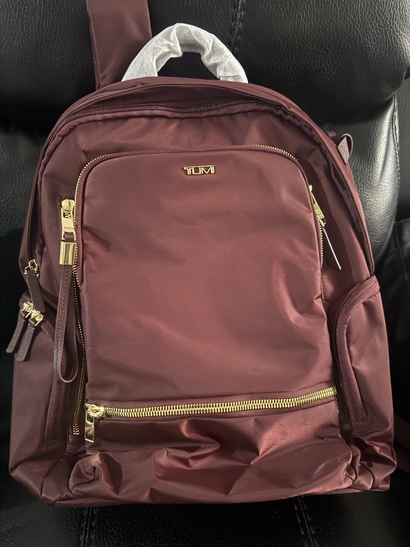 tumi celina bagpack (Category: Laptop Bags & Sleeves) located in Caloocan City. Submitted by izzie_finds (Listing ID 1464437386, Image 1). Description: Double-zip entry to main compartment Zip entry to padded laptop compartment (fits up to a 15” PC or 16” MacBook screen) Leather top handle Front U-zip pocket 2 front zip pockets Front zip entry to main compartment Side zip pocketSide double-zip water-resistant water bottle pocket Padded adjustable