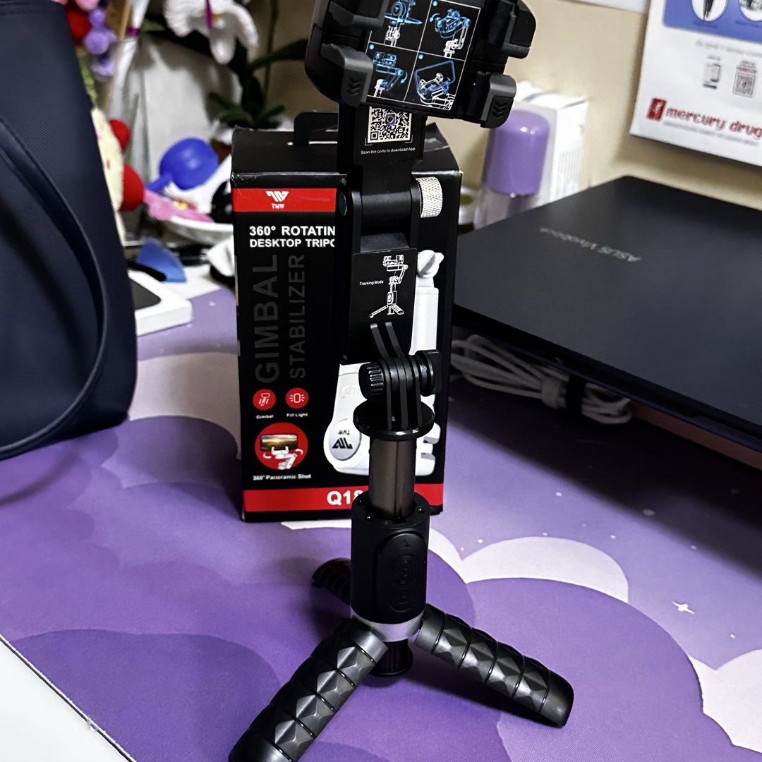 TWN Q18 360 Rotating Desktop Gimbal Stabilizer (Category: Gimbals & Stabilizers ) located in Taguig. Submitted by yessamineangel (Listing ID 1464458274, Image 2). Description: - TWN Q18 Gimbal Stabilizer - 360 Rotating Desktop Tripod - Smart Tracking Feature - Built-in Fill Light - 360 Panoramic Shot Capability - Includes Remote Control - Perfect for Stable Video Recording.