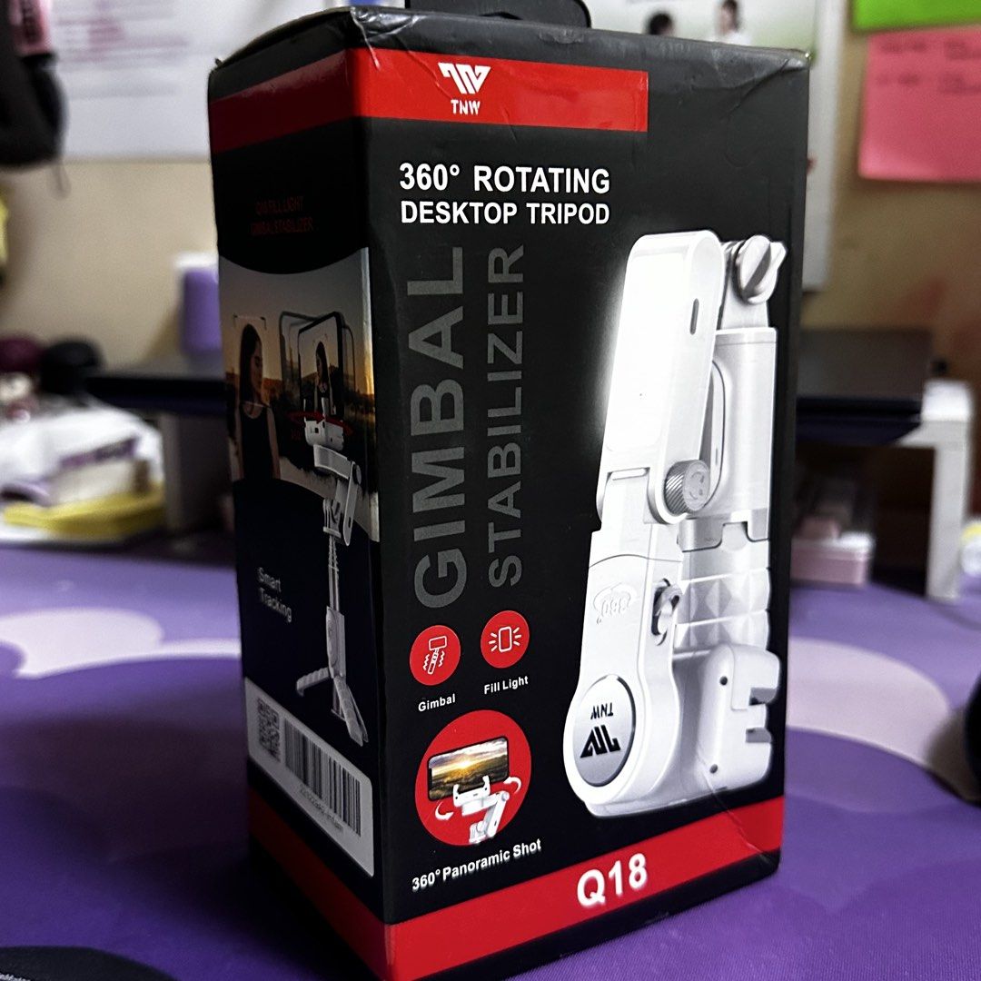 TWN Q18 360 Rotating Desktop Gimbal Stabilizer (Category: Gimbals & Stabilizers ) located in Taguig. Submitted by yessamineangel (Listing ID 1464458274, Image 1). Description: - TWN Q18 Gimbal Stabilizer - 360 Rotating Desktop Tripod - Smart Tracking Feature - Built-in Fill Light - 360 Panoramic Shot Capability - Includes Remote Control - Perfect for Stable Video Recording.