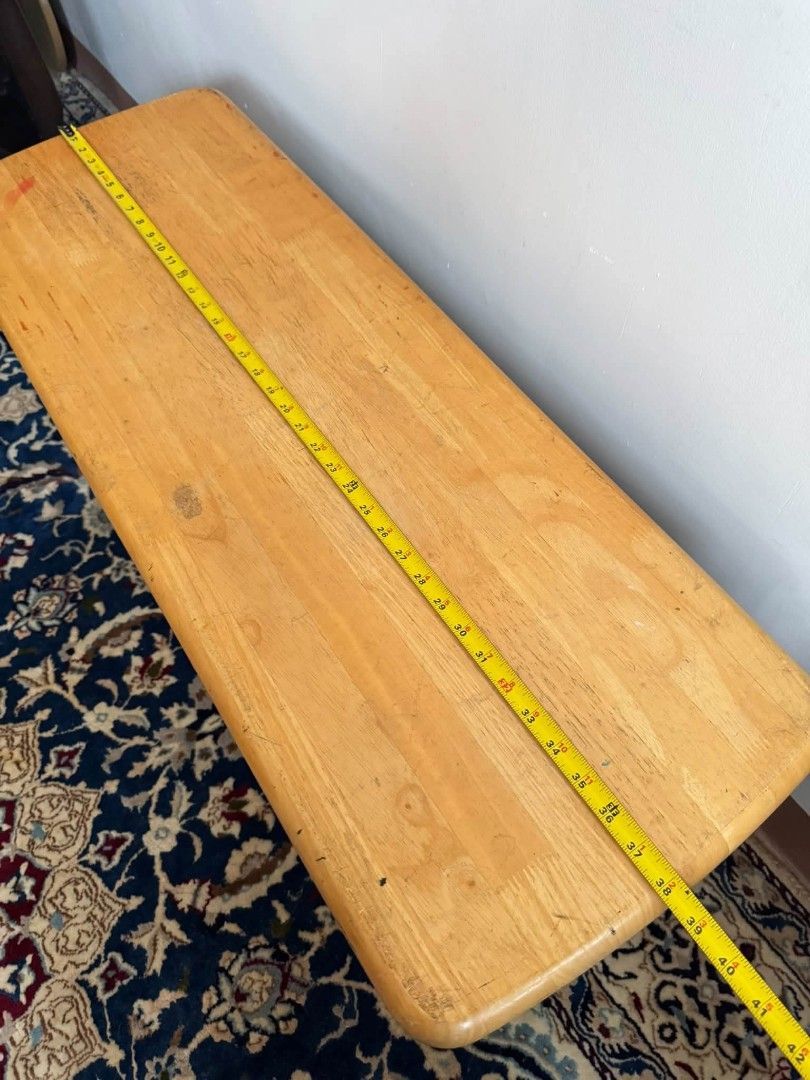 Two Tone Wooden Bench (Category: Chairs) located in Quezon City. Submitted by dannikkishoppe2 (Listing ID 1464385734, Image 3). Description: Two Tone Wooden Bench ‼️₱4500‼️ • light wood top and dark green legs. • Rounded corners on the wood top. • Legs feature a classic turned detail. • Ideal for entryways or as a footrest. • Dimensions: Approximately 40 inches long, 15 inches wide, and 18 inches high. • Note: Minor marks present on the wood top.