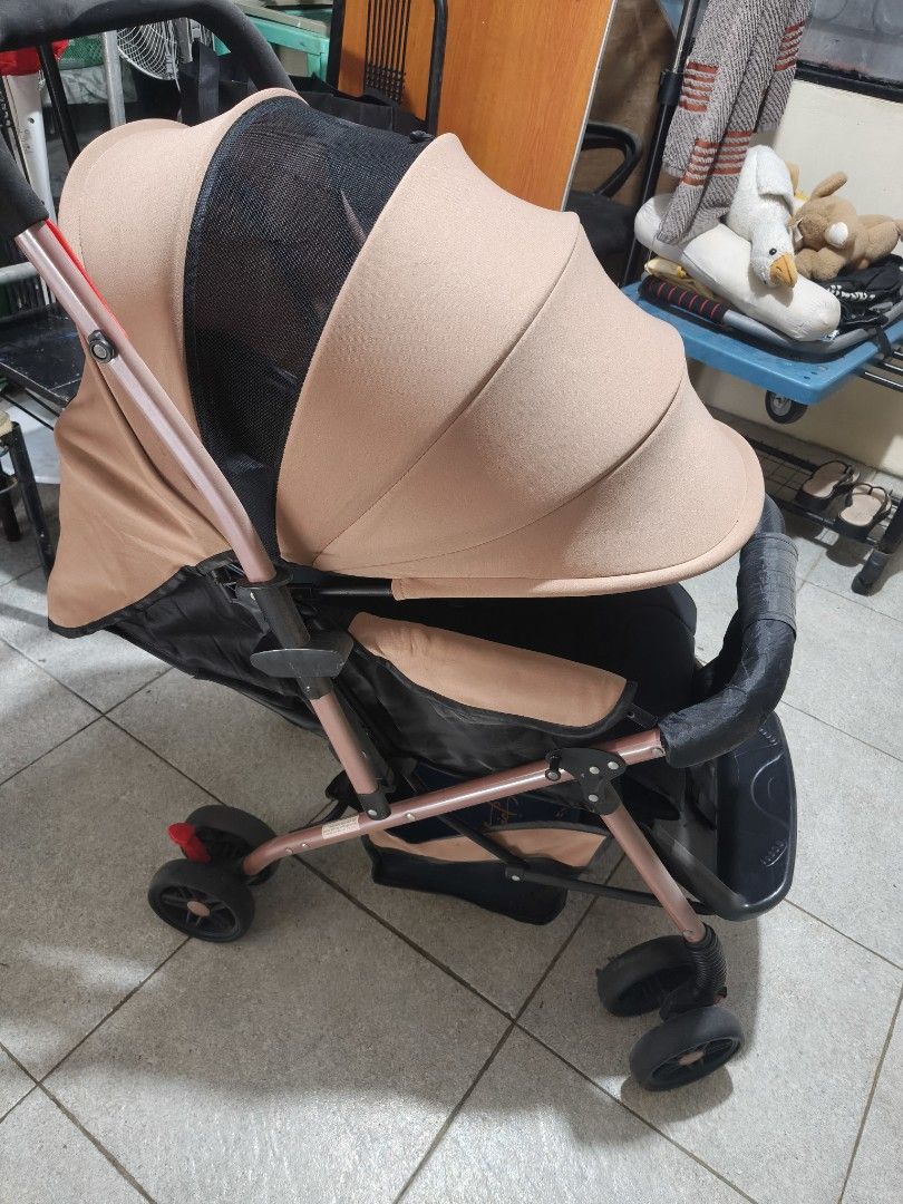 Two way Baby Stroller - 🟤 Brown color (Category: Strollers) located in Cainta. Submitted by ajoie.dclttr (Listing ID 1464468294, Image 3). Description: - Easy to fold and carry, perfect for travel or daily use. - Comfortable padded seat and harness for your little one. - Canopy offers shade from the sun. - Convenient storage basket underneath. - Chic rose gold frame adds a stylish touch. - Folds compactly for easy storage. -With free 2 unused Pi