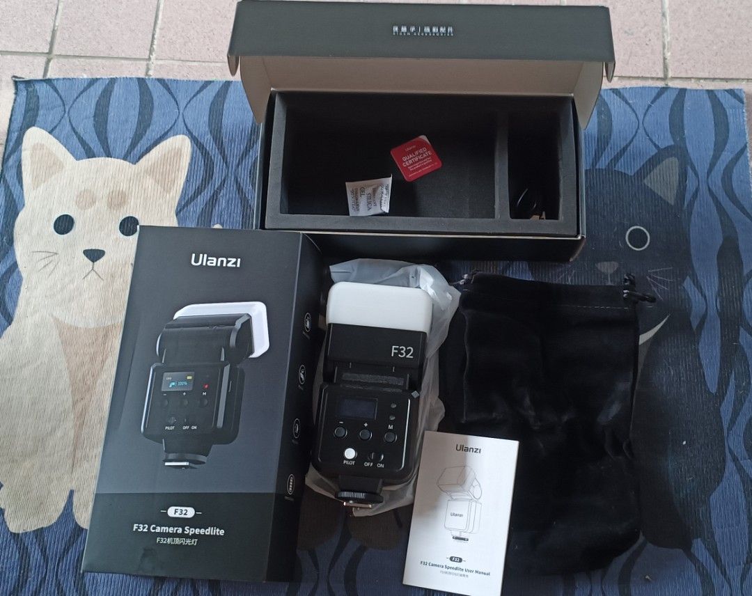 Ulanzi F32 Camera Speedlite Flash (Category: Flashes) located in Manila. Submitted by cgbcollection (Listing ID 1464444142, Image 1). Description: - Ulanzi F32 Camera Speedlite - Features a display screen - Comes with original box, manual, cable and carrying pouch - All accessories included - Ideal for photography enthusiasts Key Specifications • Guide Number (GN): 32 (at ISO 100) • Color Temperature: 5600K ± 200K • Battery Capacity: 1400mAh (USB