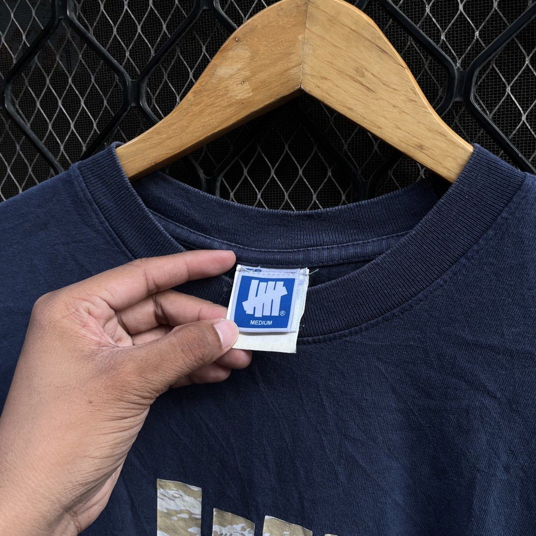 Undefeated camo logo shirt (Category: Tshirts & Polo Shirts ) located in Taguig. Submitted by scoutandloots (Listing ID 1464444602, Image 3). Description: Undefeated camo logo shirt • Size: M •21x28.