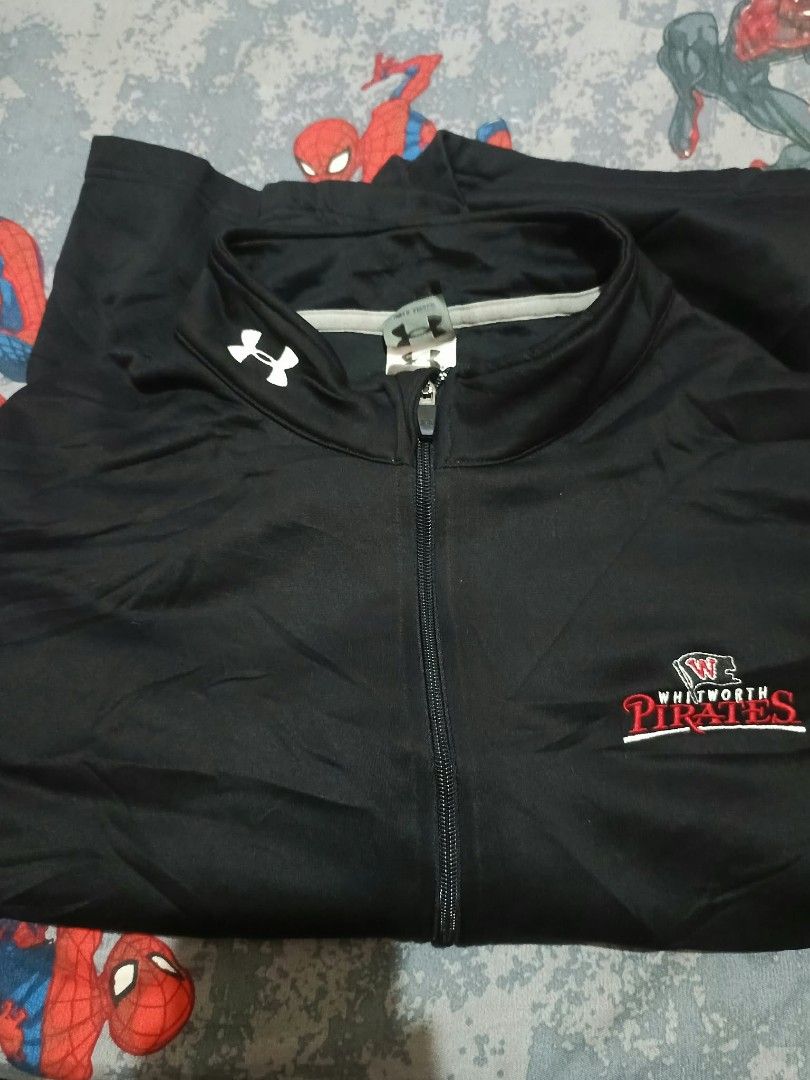 Under Armour Whitworth Pirates 1/4 Zip Jacket (Category: Coats, Jackets and Outerwear) located in Manila. Submitted by christian_22 (Listing ID 1464439064, Image 1). Description: - Black Under Armour jacket - Features Whitworth Pirates logo on chest - Quarter zip design - Ideal for sports or casual wear - Under Armour branding on the back.