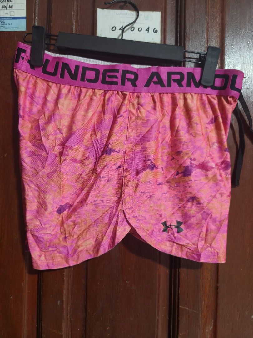 Under atlethic shorts. (Category: Shorts) located in Quezon City. Submitted by makmakramirez (Listing ID 1464461073, Image 2). Description: size 26-32 length 11 inches Item: Women's/Girls' Under Armour athletic shorts. ​Brand: Under Armour (logo on hem and branded elastic waistband). ​Pattern/Color: Pink, orange, and purple tie-dye abstract pattern. ​Size: Youth Large (YLG / JGA). ​Features: Elastic waistband with drawstring and white mesh inner 