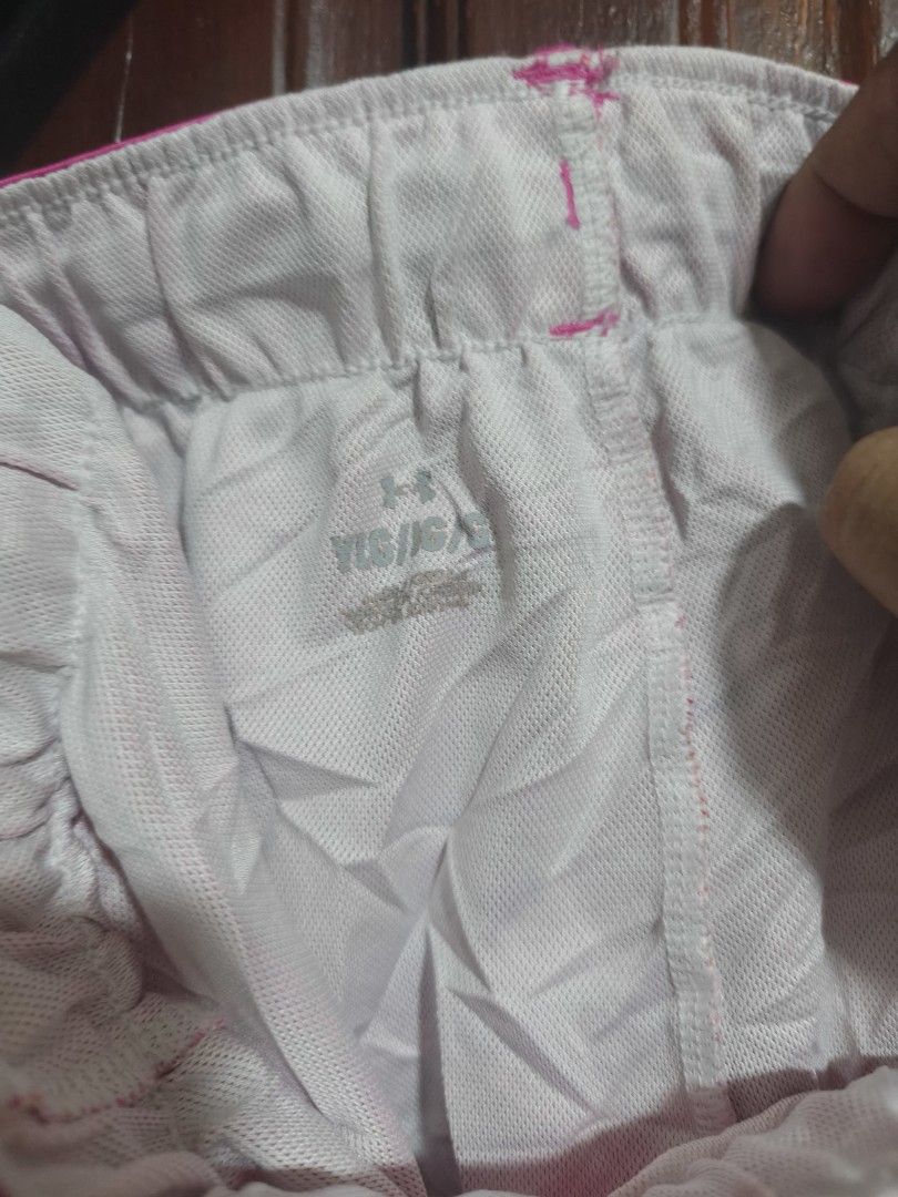 Under atlethic shorts. (Category: Shorts) located in Quezon City. Submitted by makmakramirez (Listing ID 1464461073, Image 3). Description: size 26-32 length 11 inches Item: Women's/Girls' Under Armour athletic shorts. ​Brand: Under Armour (logo on hem and branded elastic waistband). ​Pattern/Color: Pink, orange, and purple tie-dye abstract pattern. ​Size: Youth Large (YLG / JGA). ​Features: Elastic waistband with drawstring and white mesh inner 