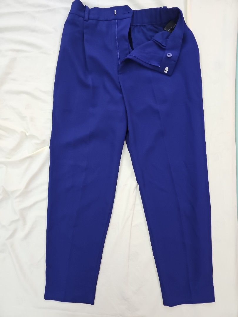 Uniqlo Blue Polyester Pants Size S (Category: Other Bottoms) located in Muntinlupa City. Submitted by shoptitak (Listing ID 1464467277, Image 2). Description: - Uniqlo Pants - Vibrant Blue Color - 100% Polyester - Comfortable Elastic Waistband - Size: S - Waist: 60-64cm - Hips: 85-91cm - Ideal for everyday and casual wear.