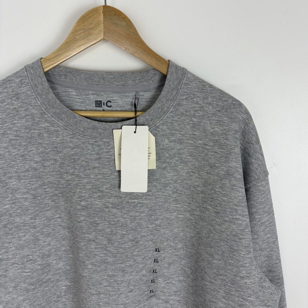Uniqlo :C Oversized Grey Sweatshirt (Category: Coats, Jackets and Outerwear) located in Calamba. Submitted by 2muchclothes_ (Listing ID 1464423172, Image 2). Description: Measurements Size: XL Width: 26 Length: 28.5 Shoulder: 23.5 Sleeve: 23.