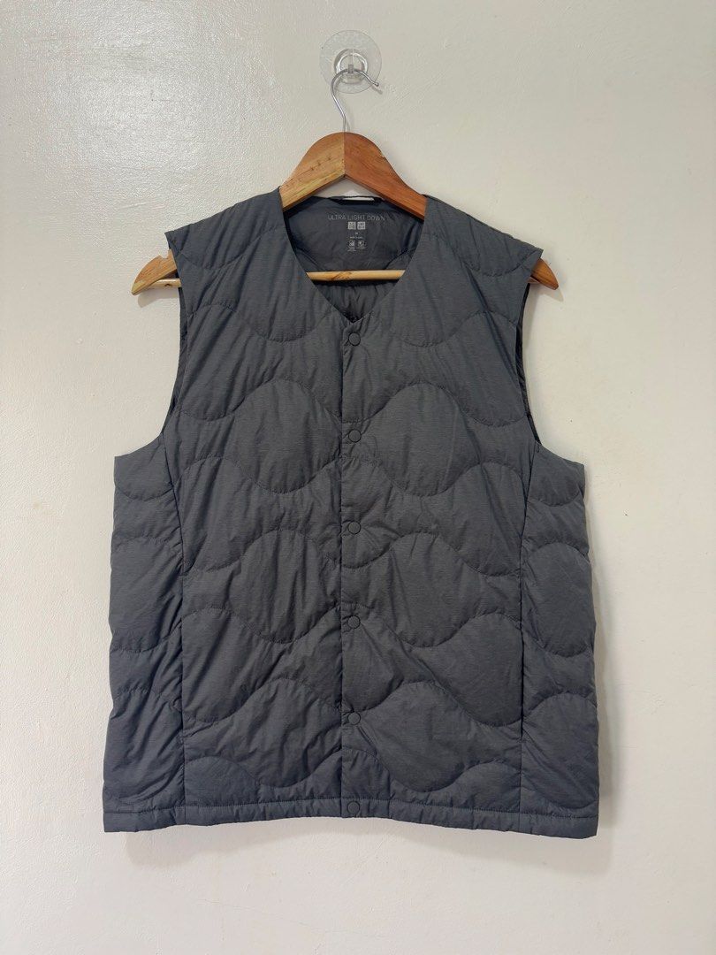 Uniqlo Gray Vest Men Medium (Category: Coats, Jackets and Outerwear) located in Balanga. Submitted by winterlab_ph (Listing ID 1464458752, Image 1). Description: Code: C055 Width: 20.5 Length: 25 Shoulders: 15.5 : needs wash.