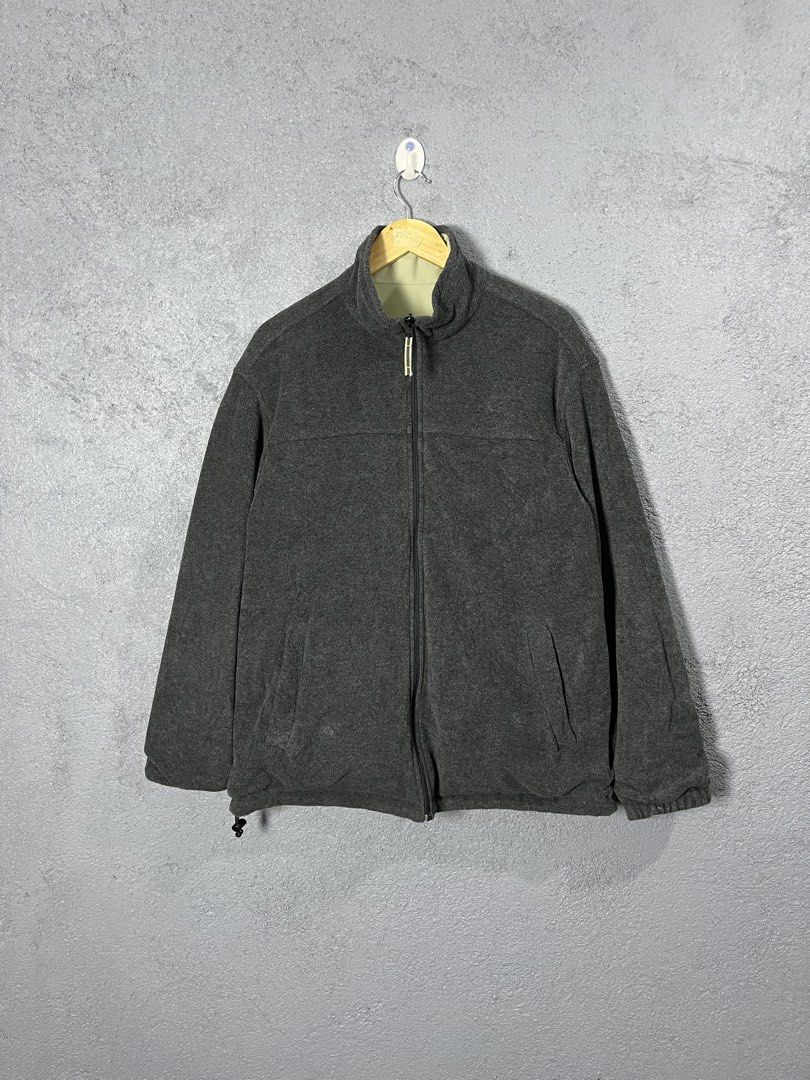 Uniqlo Reversible Jacket Grey Fleece (Category: Coats, Jackets and Outerwear) located in Famy. Submitted by basicthrifted (Listing ID 1464529775, Image 2). Description: - Reversible design: khaki water-resistant shell on one side, cozy grey fleece on the other. - Full zip closure for easy wear. - Functional pockets on both sides. - Perfect for versatile layering..
