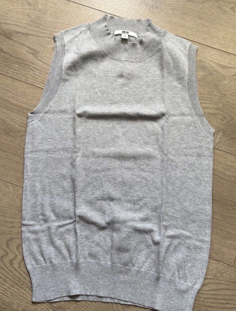 Uniqlo Sleeveless Knit Top (Category: Sleeveless) located in Makati City. Submitted by karenjoyofthrifts (Listing ID 1464466645, Image 2). Description: Uniqlo Sleeveless sweater Size Small Color Gray.