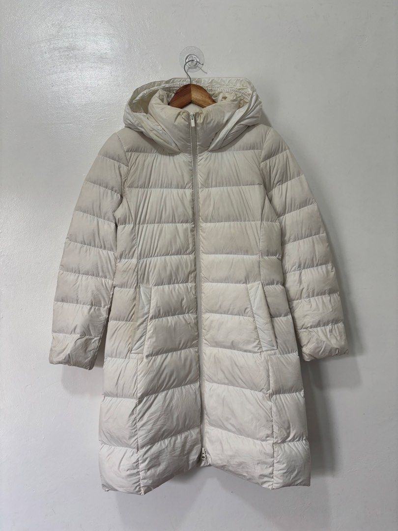 Uniqlo White Down Puffer Jacket Women Small (Category: Coats, Jackets and Outerwear) located in Balanga. Submitted by winterlab_ph (Listing ID 1464455064, Image 1). Description: Code: C036 Width: 17.5 Length: 35 Shoulders: 15.5 Sleeves: 24 : needs wash.