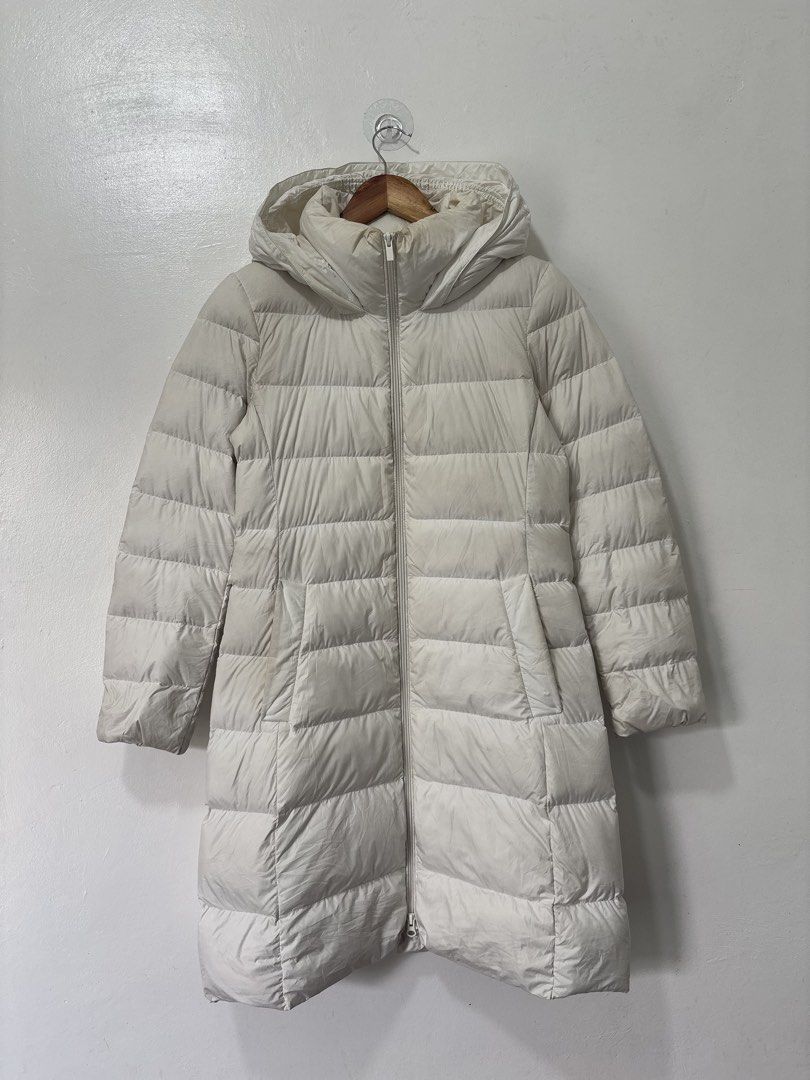 Uniqlo White Down Puffer Jacket Women Small (Category: Coats, Jackets and Outerwear) located in Balanga. Submitted by winterlab_ph (Listing ID 1464455064, Image 3). Description: Code: C036 Width: 17.5 Length: 35 Shoulders: 15.5 Sleeves: 24 : needs wash.
