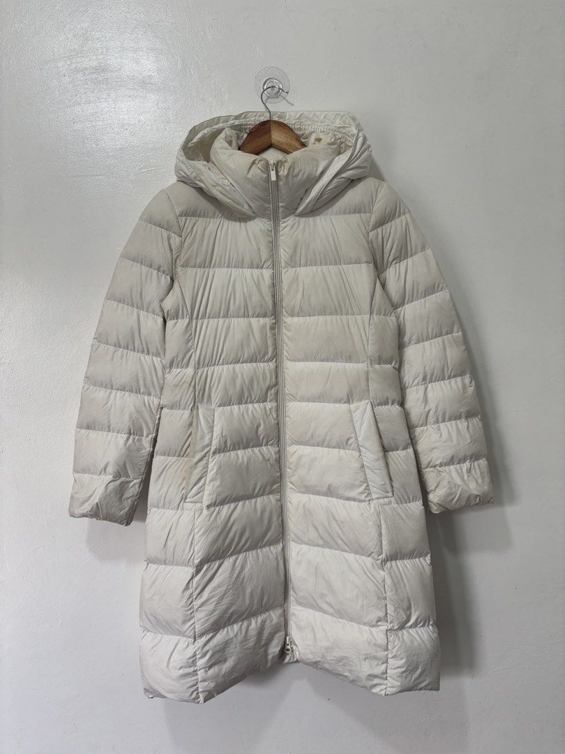 Uniqlo White Down Puffer Jacket Women Small (Category: Coats, Jackets and Outerwear) located in Balanga. Submitted by winterlab_ph (Listing ID 1464455064, Image 2). Description: Code: C036 Width: 17.5 Length: 35 Shoulders: 15.5 Sleeves: 24 : needs wash.