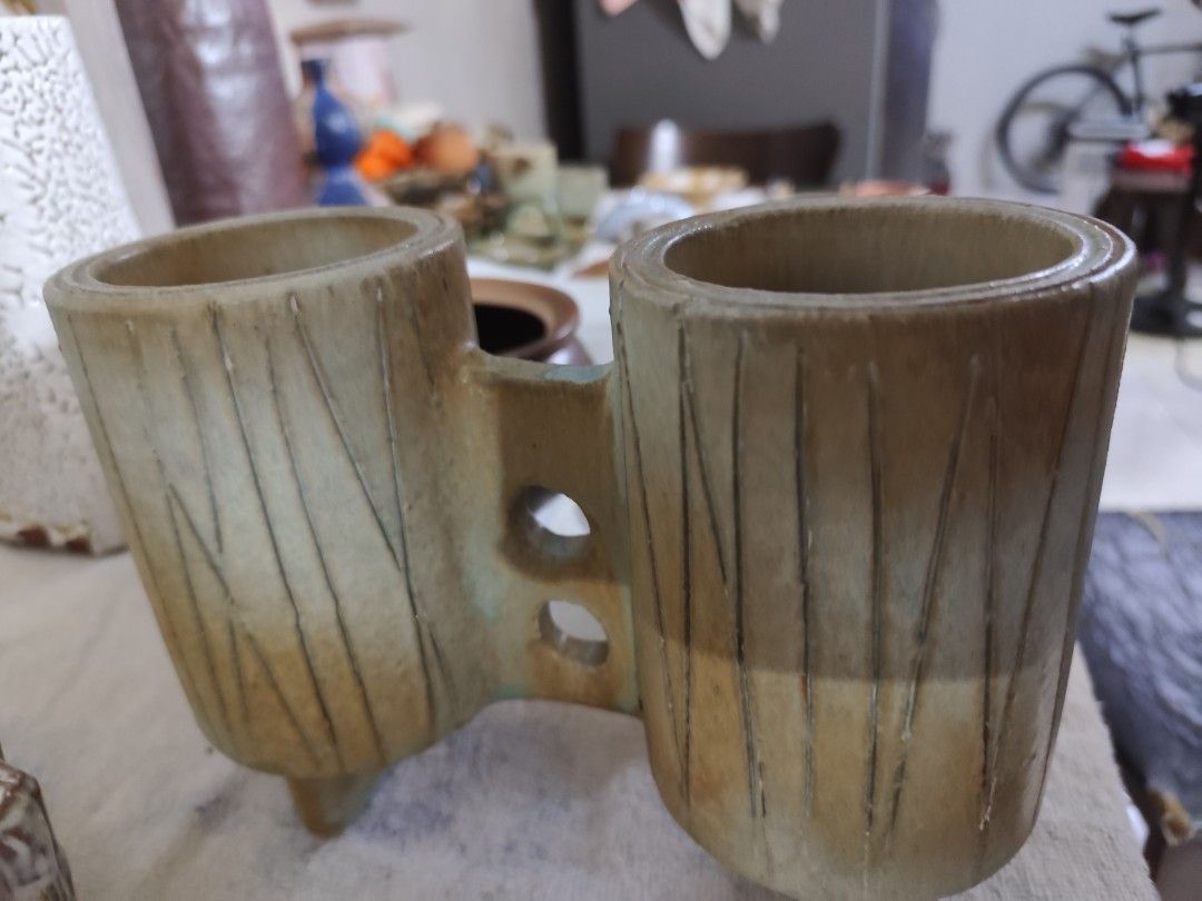 Unique Double Ceramic Pot Planter (Category: Pots & Planters) located in Manila. Submitted by marriage031073advocate (Listing ID 1464419054, Image 2). Description: - Unique double ceramic pot with vertical line design. - Ideal for small plants or succulents. - Doubles as a desk organizer for pens or brushes. - Dimensions: Approx. X inches tall, Y inches wide. - A unique decorative piece for your home..