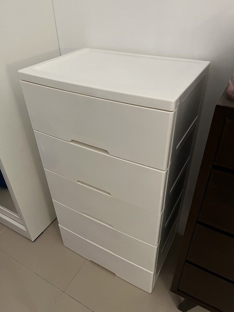 URATEX White 5-Drawer Plastic Storage Cabinet (Category: Shelves, Cabinets & Racks) located in Cavite. Submitted by bihnibini (Listing ID 1464409562, Image 1). Description: - LAST PRICE POSTED -White plastic storage cabinet with 5 drawers. - Ideal for organizing clothes, toys, or other household items. - Drawers slide smoothly for easy access. - Still in good, working condition. - LAST PRICE POSTED.