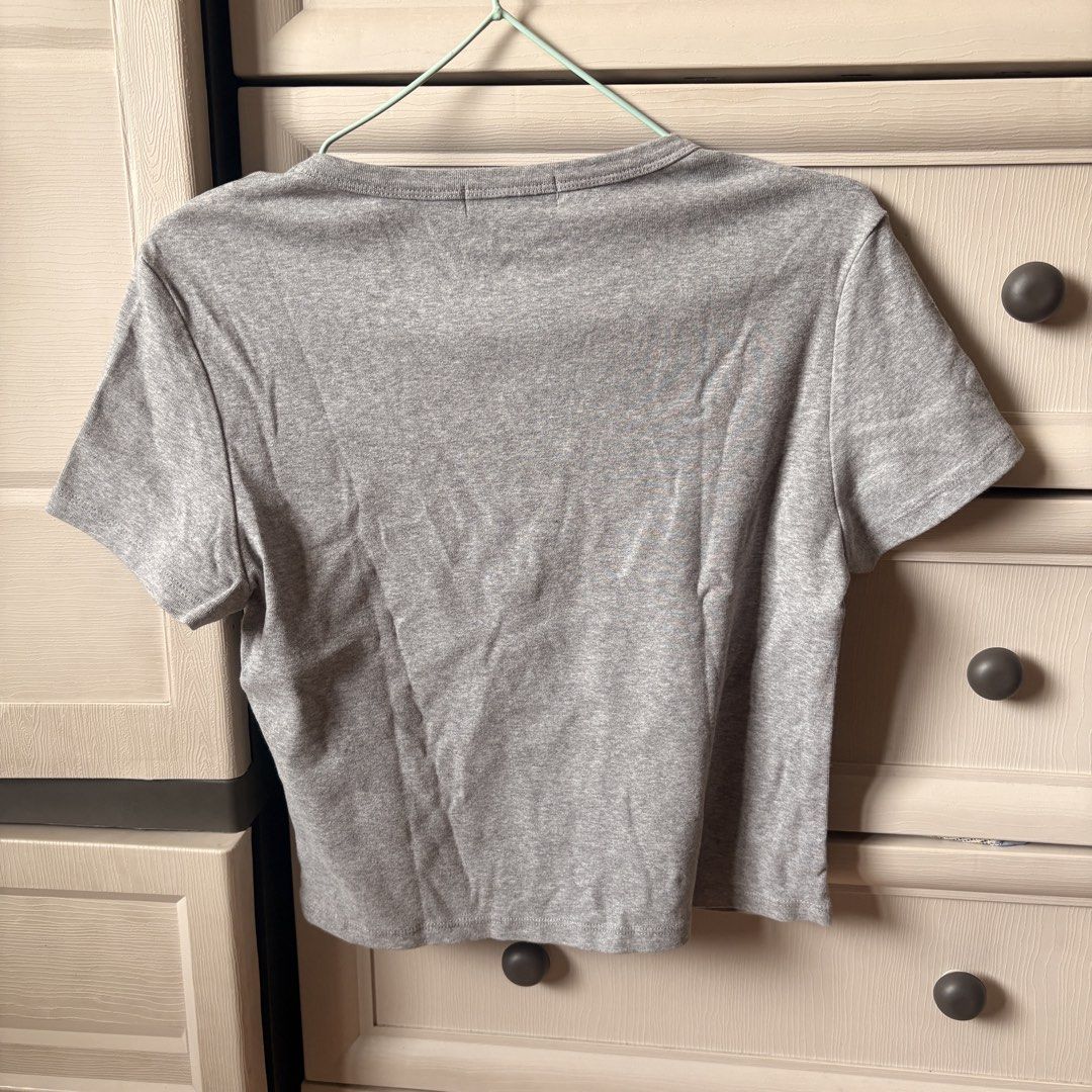 Urban Revivo Top (Category: Shirts) located in Makati City. Submitted by iu__00 (Listing ID 1464391870, Image 3). Description: - Grey t-shirt from Urban Revivo - Size: Xl on tag best fit to med - Features a cute black cat graphic inside an orange heart - Short sleeves and crew neck - Ideal for casual wear.