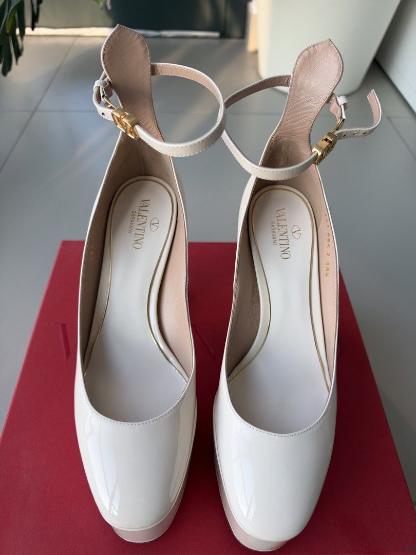 VALENTINO Tan Go Platform 120mm (Category: Sneakers & Footwear) located in Quezon City. Submitted by wasmynnowurs (Listing ID 1464494387, Image 3). Description: Arriving in November I won’t respond to silly offers. Thanks! Bought for a cancelled event. Priced to sell. Heel height 120mm =4.724 in More details here: https://www.mytheresa.com/me/en/women/valentino-garavani-tan-go-patent-leather-platform-pumps-white-p00640348?dplink=true&utm_source=s