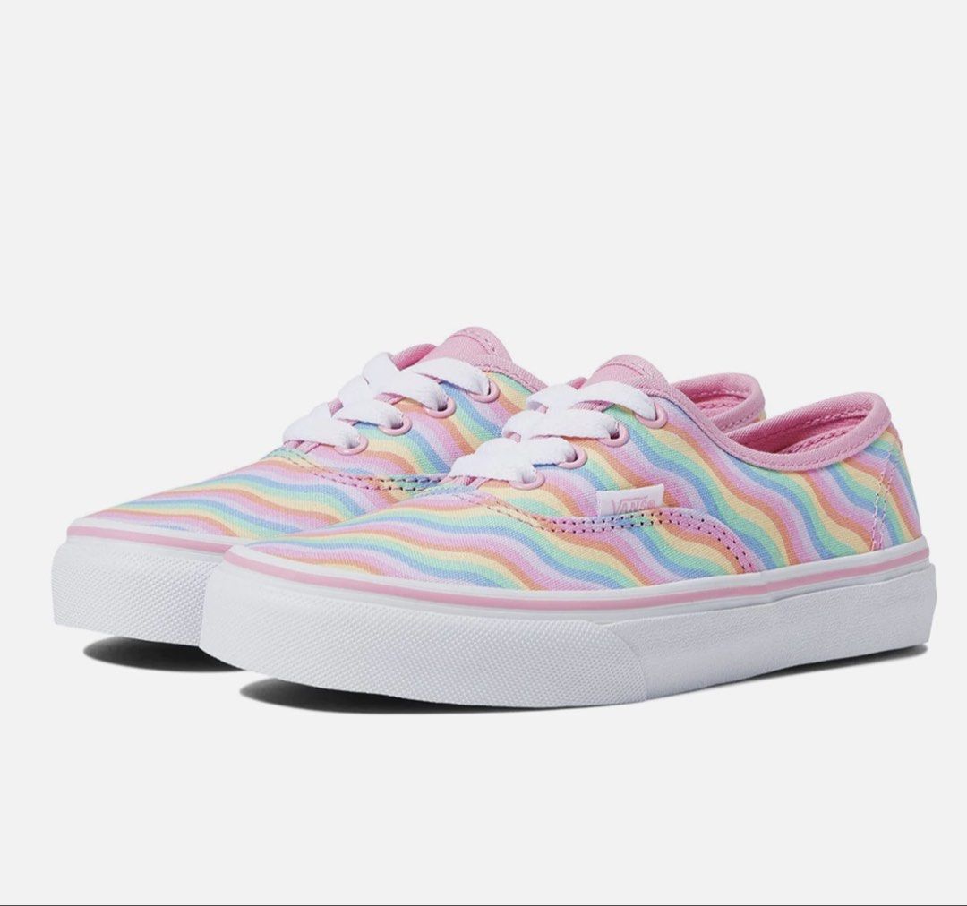 Vans Authentic Rainbow Wave Sneakers (Category: Babies & Kids Fashion) located in Leyte. Submitted by handmedownp (Listing ID 1464384984, Image 1). Description: - Cute Vans Authentic sneakers - Features a vibrant rainbow wave pattern - Pink trim and white laces - Ideal for casual wear - Shows some signs of wear on soles and canvas, but plenty of life left - Adds a pop of color to any outfit Needs cleaning lang! Overall in VGUC .
