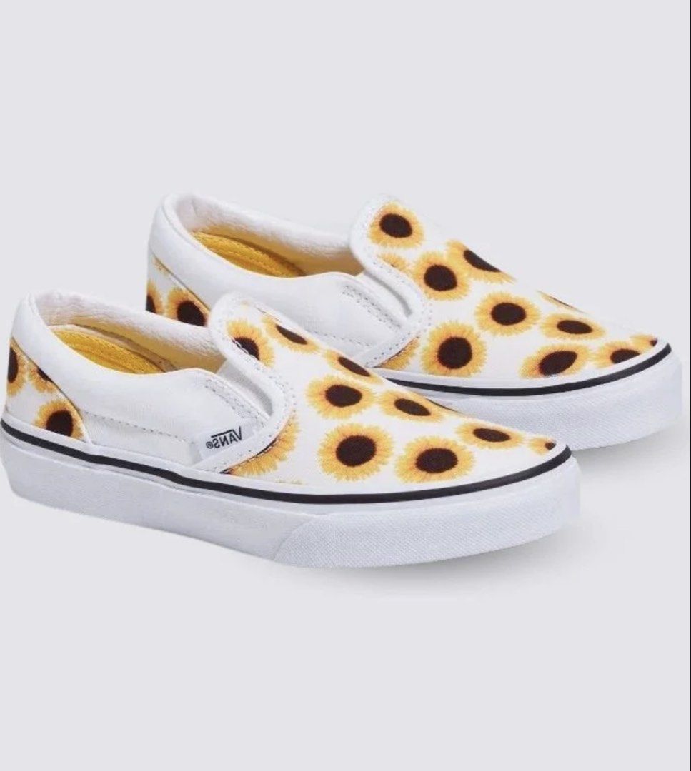 Vans Slip-On Sunflower Print Shoes (Category: Babies & Kids Fashion) located in Leyte. Submitted by handmedownp (Listing ID 1464383813, Image 1). Description: - Classic Vans slip-on style - Fun all-over sunflower print (white canvas with yellow & brown sunflowers) - Elastic side accents for easy on and off - Durable rubber sole - Ideal for casual outings and everyday wear Condition as is sa pic :) needs washing.