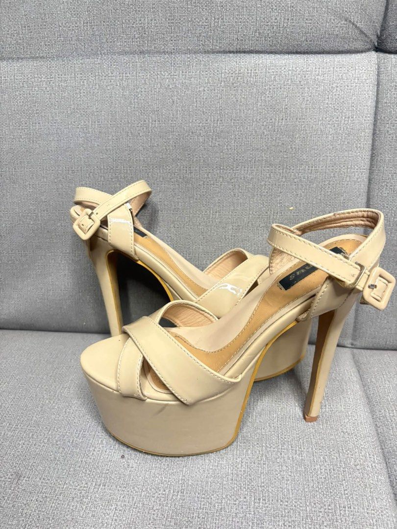 Venus 6-inch heels (Category: Heels) located in Cavite. Submitted by azaleakira (Listing ID 1464396205, Image 1). Description: - Elegant beige platform heels - Features stylish criss-cross straps on the front - Adjustable ankle strap with buckle for a secure fit - Chic stiletto heel design - Versatile and easy to pair with various outfits - Ideal for dressing up any look.