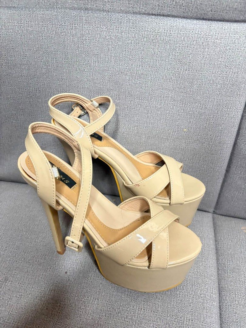 Venus 6-inch heels (Category: Heels) located in Cavite. Submitted by azaleakira (Listing ID 1464396205, Image 2). Description: - Elegant beige platform heels - Features stylish criss-cross straps on the front - Adjustable ankle strap with buckle for a secure fit - Chic stiletto heel design - Versatile and easy to pair with various outfits - Ideal for dressing up any look.