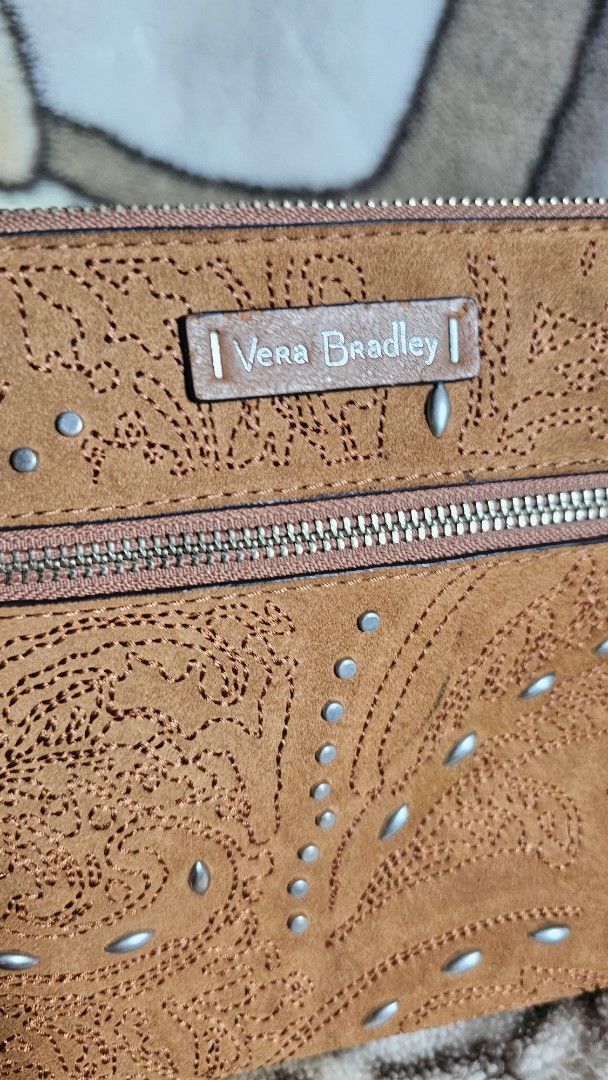 Vera Bradley leather crossbody bag (Category: Cross-body Bags) located in Quezon City. Submitted by jollythrift (Listing ID 1464372577, Image 2). Description: Original cute Vera Bradley crossbody bag Genuine leather clean and like new inside issue : replaced sling strap.