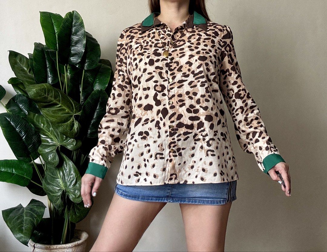 Vero Moda Leopard Print Button-Up Shirt,s to m (Category: Shirts) located in Mandaluyong City. Submitted by roxieeeeeee (Listing ID 1464538508, Image 1). Description: - Vero Moda leopard print button-up shirt - Collared neckline - Long sleeves with green cuffs - Gold button details - Pairs well with denim - A fun statement piece ✅ Like new condition ✅ Ships 1 day after payment ✅ Please allow 1 day for preparation (wash, dry, iron) Items are ready
