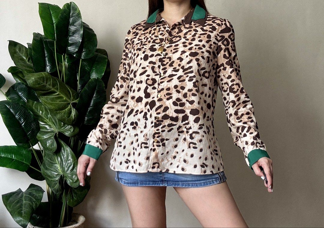 Vero Moda Leopard Print Button-Up Shirt,s to m (Category: Shirts) located in Mandaluyong City. Submitted by roxieeeeeee (Listing ID 1464538508, Image 2). Description: - Vero Moda leopard print button-up shirt - Collared neckline - Long sleeves with green cuffs - Gold button details - Pairs well with denim - A fun statement piece ✅ Like new condition ✅ Ships 1 day after payment ✅ Please allow 1 day for preparation (wash, dry, iron) Items are ready