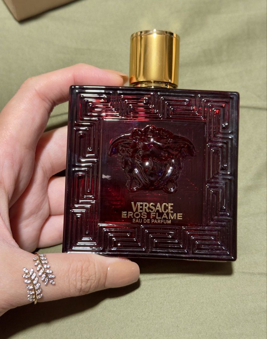 Versace Eros Flame EDP Tester 100ml (Category: Fragrance & Deodorants) located in Balagtas. Submitted by venta.shop (Listing ID 1464460775, Image 1). Description: Tester box but guaranteed original. I do not sell fake items. 🫶 - Versace Eros Flame Eau de Parfum - Tester bottle - 100ml / 3.4 fl.oz - Striking red glass bottle with a textured design - Elegant gold cap.